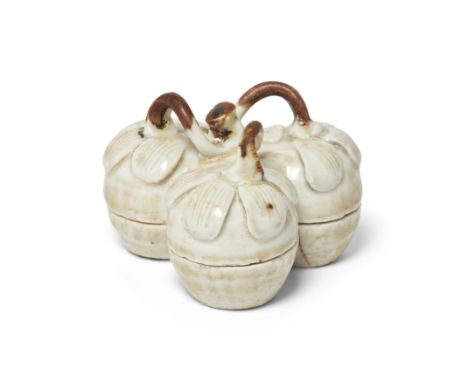 A Chinese qingbai 'fruit' box and coverSouthern Song dynastyFormed as three conjoined vessels, with single central leafy stem