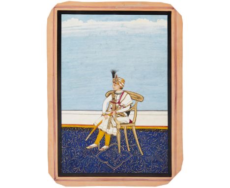 A seated portrait of a young prince, Rajasthan, North India, late 19th/early 20th century, facing left, wearing white tunic a