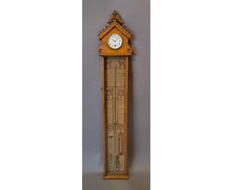 An Admiral Fitzroy Barometer Thermometer/Clock, the carved cresting incorporating a clock with single train movement, 120 cms