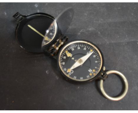 A World War II German Compass, inscribed Busch and bearing inscription 1935