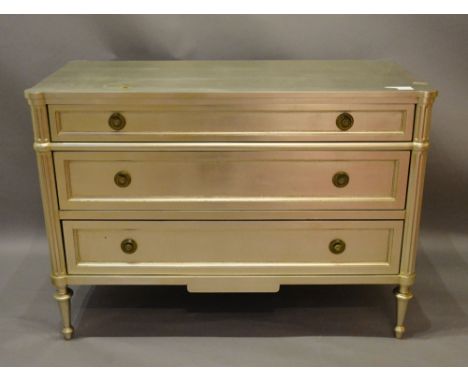 A French Spiral Silvered Commode with three drawers and circular brass handles raised upon turned tapering legs, 120 cms wide