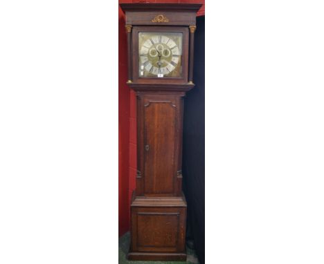 An anonymous George III oak and mahogany inlaid long case clock, flat top to hood, with later applied gilt metal bay &amp; la