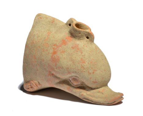 A Hellenistic dolphin head vessel circa 3rd century BC terracotta, naturalistically modelled with a pierced strainer to the t