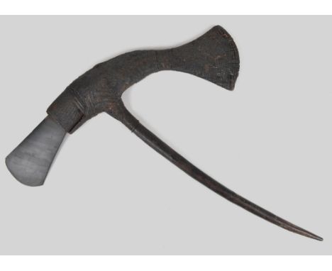 A Papua New Guinea axe Melanesia with a stone blade and woven fibre binding, 52.5cm long.