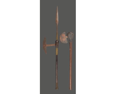 A Shona axe Zimbabwe with two iron blades and brass wirework to the shaft, 83.5cm long, and a Zulu axe, with a copper blade a
