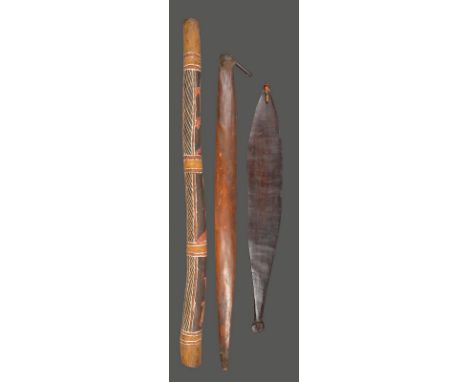An Aboriginal spear thrower woomera Queensland, Australia with resin and a notched wood spike, 78cm long, an Aboriginal woome