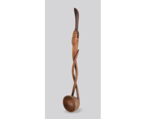 A snake handled spoon possibly South Africa with an oval bowl and interlaced handle and a curved tongue terminal, 30.5cm long