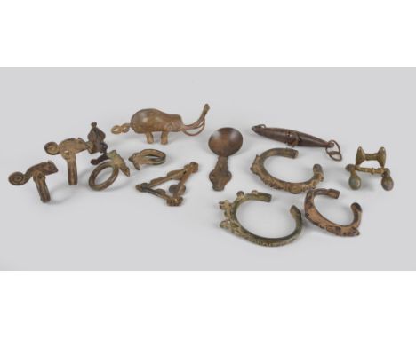 Four Senufo zoomorphic rings Ivory Coast brass, three Senufo brass bracelets, four Ashanti gold weights; an elephant, a bird 