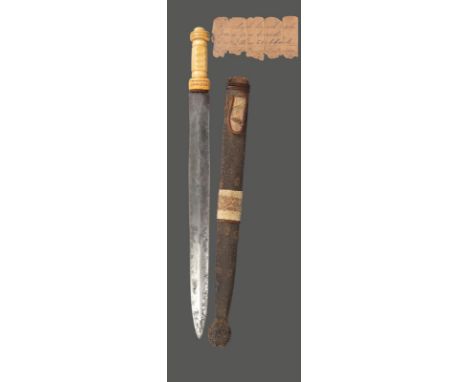 λA Benin sword and sheath Nigeria with a 19th century French steel blade and a carved ivory handle, the snake skin, fibre and