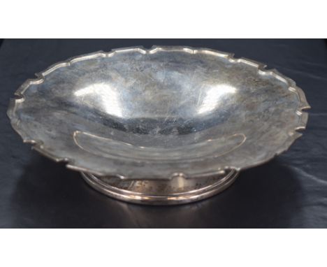 A George VI silver footed dish, of circular form with Chippendale inspired moulded edge detail, raised on a moulded circular 