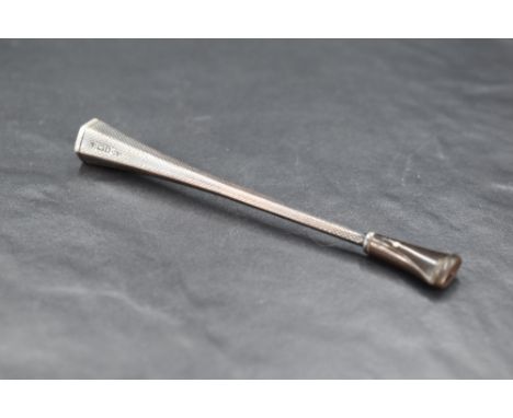 An early Queen Elizabeth II Alfred Dunhill silver cheroot holder, of hexagonal tapering form with engine-turned surface, the 