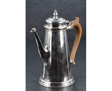 A Queen Elizabeth II silver coffee pot, of spreading cylindrical form with finial topped, moulded and hinged cover over the s