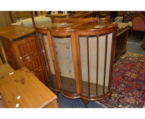 A 20th century Starcraft bow fronted display cabinet, c.1950