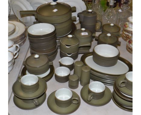 A comprehensive Denby Chevron pattern dinner service, including tureens and covers; soup bowls; cups and saucers; condiment s