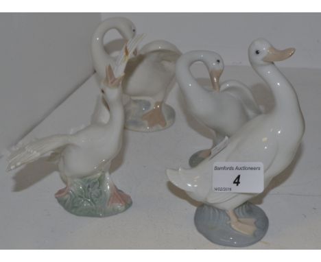 A Nao model of a Goose; a Lladro model of a Goose ; another; a Rex model;  (faults) (4)