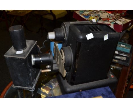 A Leitz lantern slide projector;  an early 20th century parafin lantern; another (3)
