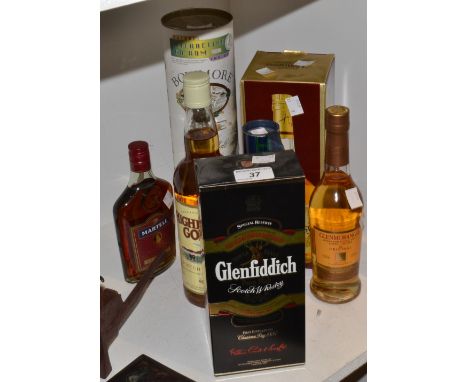 Spirits - a Bowmore single malt whisky, a Glenmorangie whisky, a Glenfiddich whisky, Highland Gold scotch whisky; Hennessy Co