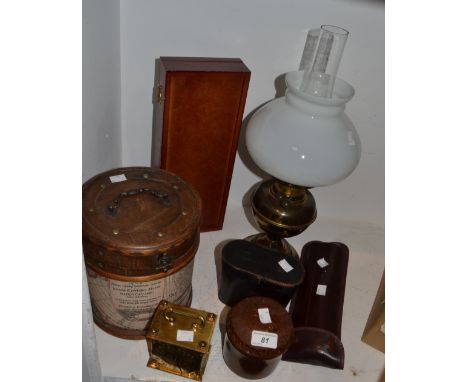 A Smiths carriage clock;  an oil lamp; a gun cleaning kit;  a bakelite tobacco jar; etc (7)