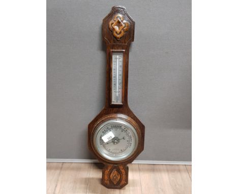 CARVED OAK ANEROID BAROMETER