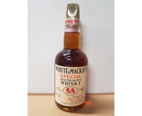 BOTTLE OF WHYTE AND MACKAY'S SPECIAL SELECTED SCOTCH WHISKY 70ø PROOF