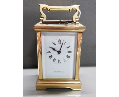 REID AND SONS NEWCASTLE ON TYNE BRASS CARRIAGE CLOCK WITH KEY