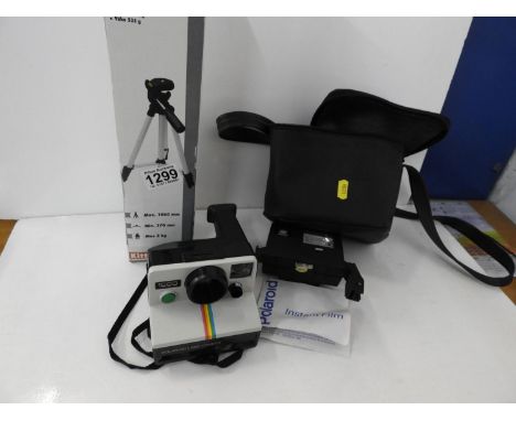 Polaroid Camera and Tripod 