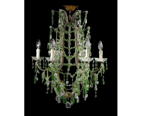 A continental glass and gilt metal six light chandelier, of open scroll form, hung with green and clear glass beads, with pea