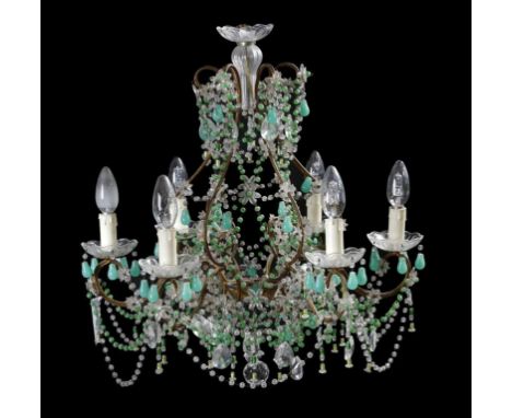 A continental glass and gilt metal six light chandelier, of open scroll form, hung with green and clear glass beads and drops