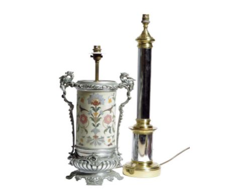 A German table lamp, the body painted with flowers and with silvered metal mounts in the Renaissance revival style, together 