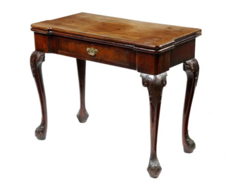 A George II mahogany card table, the rectangular hinged fold-over top with protruding corners, revealing a baize lined playin