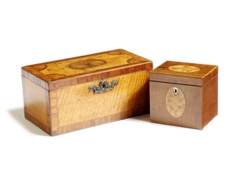 A George III satinwood and kingwood tea caddy, the hinged lid inlaid with a central fan patera and with fan spandrels, the in