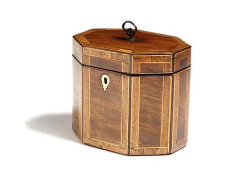 λ A George III mahogany octagonal tea caddy, inlaid with boxwood and ebonised stringing and with rosewood banding, with a lat