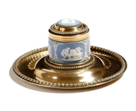 A Victorian gilt brass inkstand by Betjemann & Sons, with a Wedgwood jasperware well, decorated with classical figures, the h