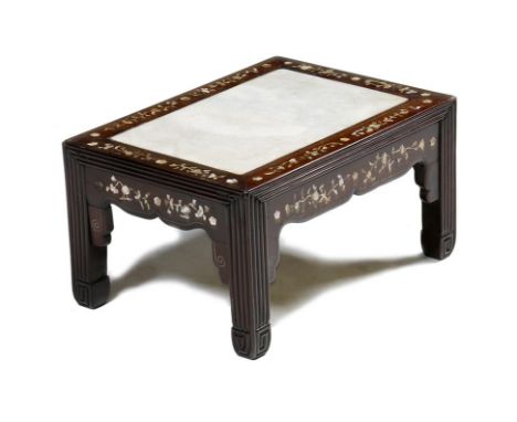 A Chinese hardwood and mother of pearl stool, with a marble inset top and inlaid with leaves and flowers, on reeded scroll le