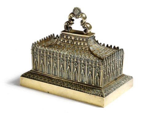 A French brass architectural inkstand, in the form of a Gothic style building with arched and quatrefoil decoration, with a s