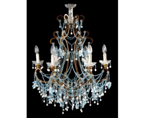A continental glass and metal six light chandelier, of open scroll form, hung with turquoise and opaline glass beads and pear