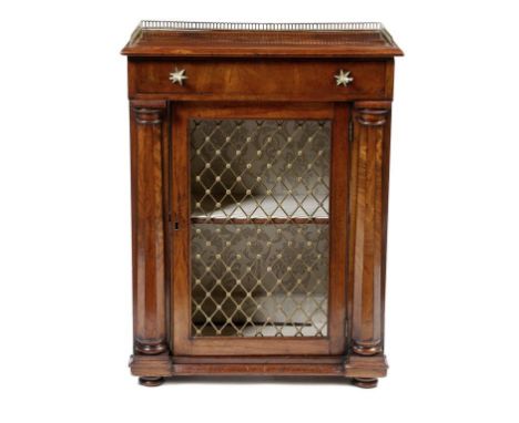 A mahogany side cabinet, with a brass gallery above a frieze drawer and a gilt brass trellis grille door enclosing a shelf, f