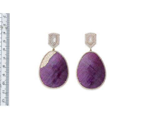 A PAIR OF RUBY AND DIAMOND PENDENT EARRINGSEach faceted ruby plaque within a surround of similarly-cut diamonds, one accented