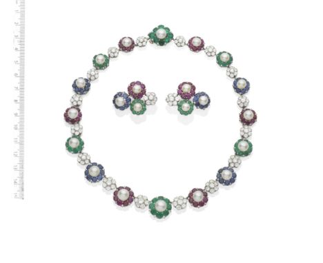 A NATURAL PEARL AND GEM-SET NECKLACE AND EARCLIP SUITESet with a graduation of natural pearl and circular-cut emerald, ruby o