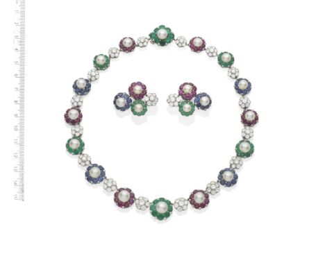 A NATURAL PEARL AND GEM-SET NECKLACE AND EARCLIP SUITESet with a graduation of natural pearl and circular-cut emerald, ruby o