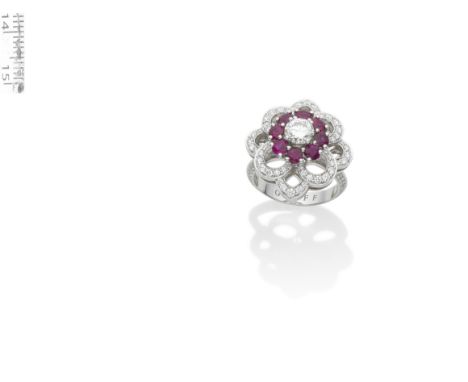 A RUBY AND DIAMOND 'ROSETTE' RING, BY GRAFFThe brilliant-cut diamond and circular-cut ruby cluster within an openwork floral 