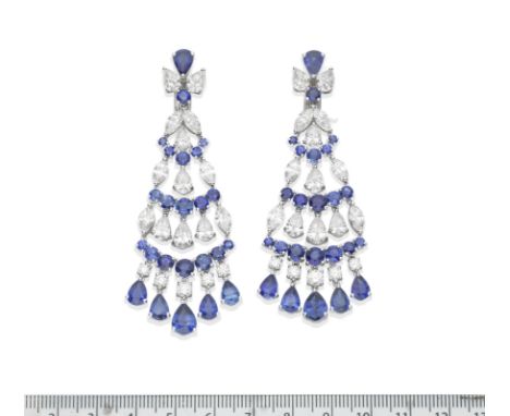 A PAIR OF SAPPHIRE AND DIAMOND 'CHANDELIER' EARRINGS, BY GRAFFEach graduated cascade of pear-shaped and circular-cut sapphire