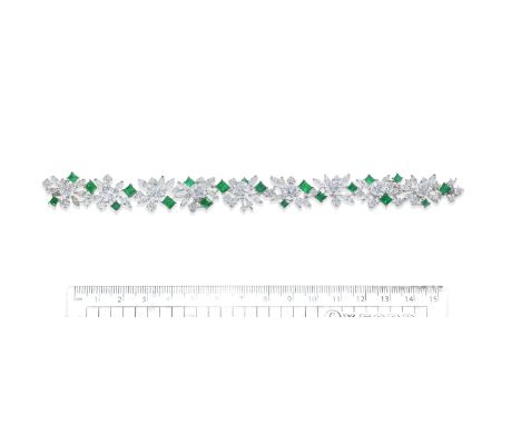 AN EMERALD AND DIAMOND BRACELET, BY  GÜBELIN, CIRCA 1965Designed as a series of brilliant and marquise-cut diamond clusters, 