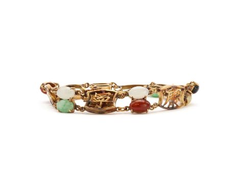 A vari-colour jade panel bracelet,a series of vari-colour jade cabochons in clawed collets, alternating to a series of Chines