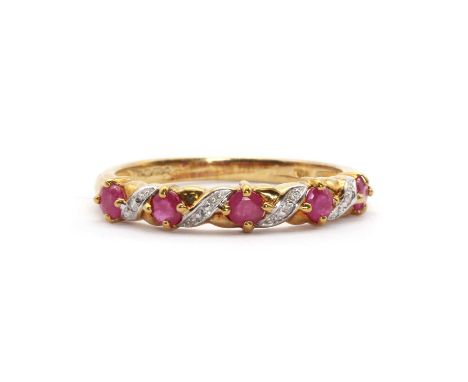 A 9ct gold ruby and diamond half eternity ring,a series of five round mixed cut ruby in clawed collet, with a series of eight