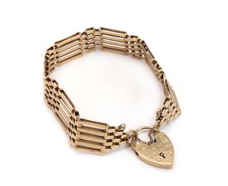 A 9ct gold gate bracelet,the five row gate bracelet, with flat outer bars and inner brick links, to heart shaped padlock and 