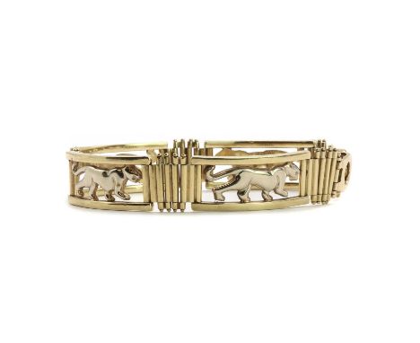 A 9ct two colour gold panel bracelet, with a series of panther design openwork panels, each 13mm wide, connected by gate styl