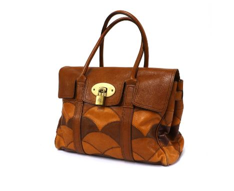 A Mulberry tan Bayswater Rio bag,brass tone hardware, dual rolled handles, padlock closure, opening to interior zip and slip 