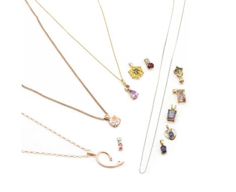 A collection of gold jewellery,comprising a 9ct rose gold coated topaz pendant, a round mixed cut coated topaz, 8mm, suspende