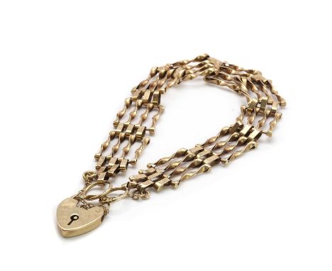 A 9ct gold four row gate bracelet,four rows of plain twisted gate links, to heart shape padlock clasp and trace link safety c
